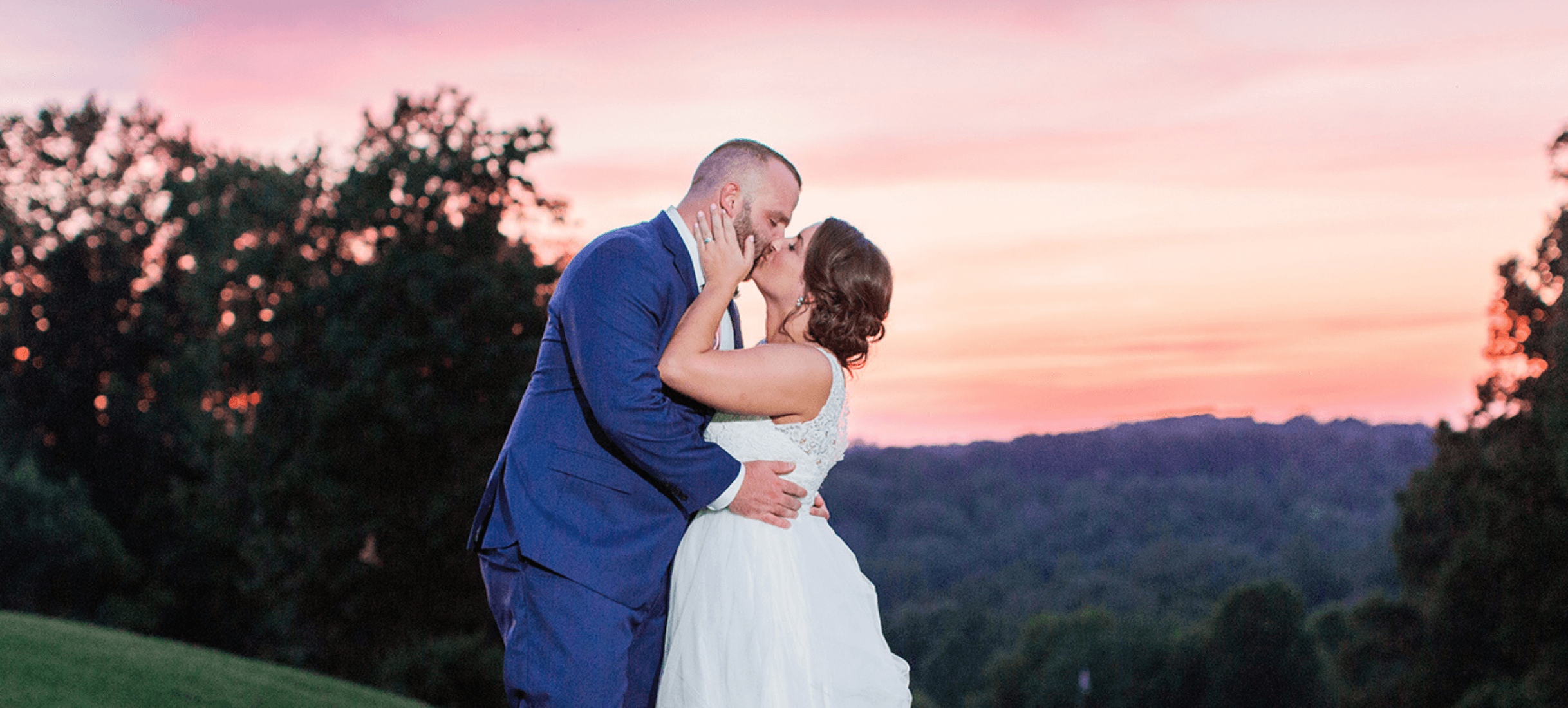 bride and groom at sunset